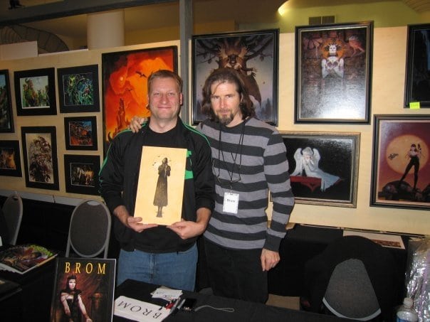 Brom with his painting, "The Grim"